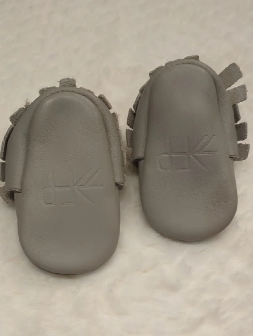 Freshly Picked Light Gray Fringe Baby Moccasins